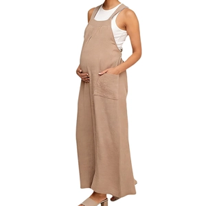 Khaki maternity wide leg overalls in thick wool fabric with practical side pockets