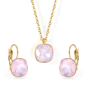 Macro view of gold-plated stainless steel jewelry set with pink square-cut zircons