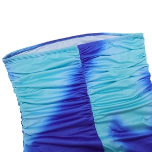 Detail of the blue purple gradient ruched fabric showing elastic texture and soft folds