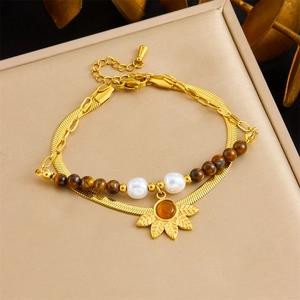 Double-layer gold flower bracelet with brown tiger eye beads and orange cat eye stone pendant