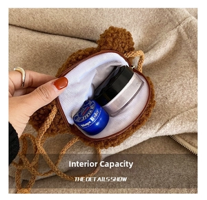 Interior storage of bear plush crossbody bag showing lipstick and powder compact