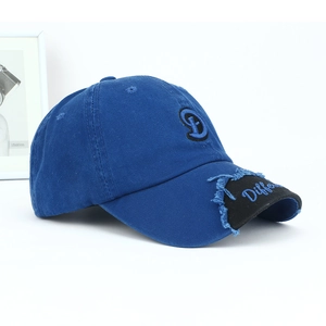 Detail view of navy cotton baseball cap with D embroidery and distressed brim edge