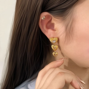Elegant 18K gold-plated stainless steel triple heart tassel earrings with crystal accent