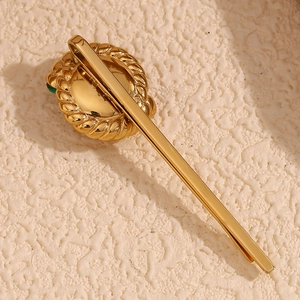 Vintage 18K gold plated stainless steel twisted hair clip with green gemstone detail