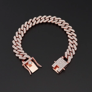 Detailed view of rose gold iced-out Cuban link bracelet with sparkling handset stones