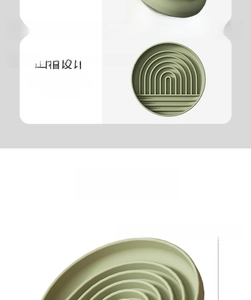 Detail view of the green silicone pet slow feeder bowl featuring internal groove design