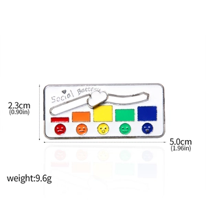 Detail of sliding social battery enamel pin showing 5cm dimensions and weight specifications