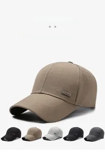 Detail of metal S FASHION emblem on textured fabric baseball cap for men