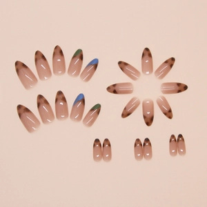 Blue and green leopard print almond press-on nails with tortoiseshell french tips