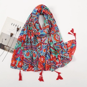 Bohemian ethnic print cotton linen scarf with red tassels and vibrant geometric patterns