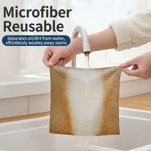 Reusable microfiber cleaning cloth showing strong grease removal under running water