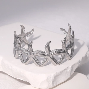Bracciale rigido aperto con stella marina in acciaio inossidabile argento su base minerale