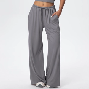 Detail view of elastic waist and drawstring on gray high-drape wide leg lounge pants