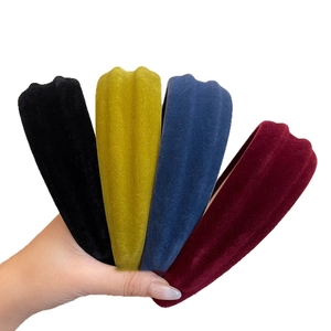 Velvet flocked headbands in black, yellow, navy and wine red colors in fan arrangement