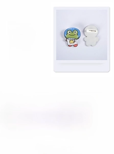 Detail of cute astronaut pins with safety backings for backpacks and clothing items