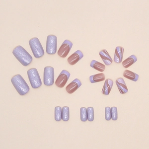 Sparkling pink purple glitter press-on nails with wave pattern and french tips design