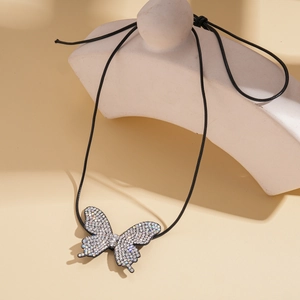 Minimalist butterfly pendant necklace with sparkling rhinestones on black cord chain