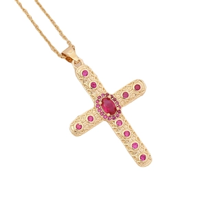 Hip hop 18K gold plated cross necklace with vibrant red zircon stones on white background