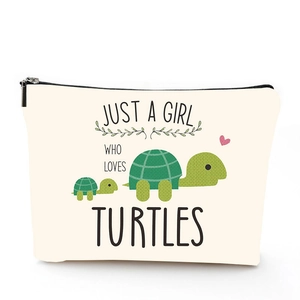 Linen makeup bag with turtle print and Just A Girl Who Loves Turtles text