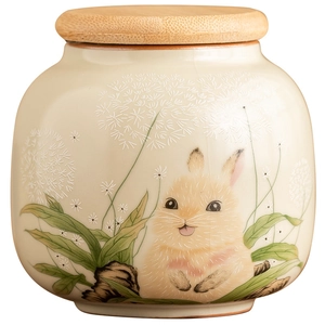 Ru-kiln ceramic tea canister with cute rabbit pattern and bamboo lid on white background