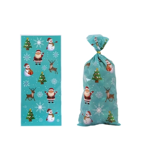 Detail of Christmas OPP gift bag featuring Santa, snowman, and reindeer patterns
