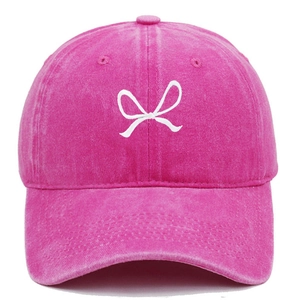 Pink washed cotton baseball cap with white bow embroidery and classic six-panel design