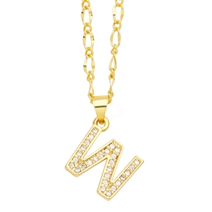 Macro shot of 18K gold Figaro chain featuring a pavé zircon letter W initial pendant