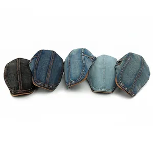 Classic washed denim newsboy caps in five colors with contrast stitching on white background