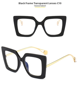 Detail of square black frame glasses with slim gold metal temples and white pearl tips