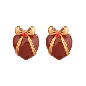 Vintage red heart earrings with golden bows and crystals on a clean white background