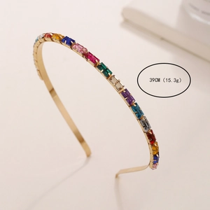 Elegant gold metal headband featuring a vibrant rainbow of rectangular colored rhinestones