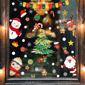 Cartoon Christmas window clings featuring Santa, Snowman, and Reindeer decorations