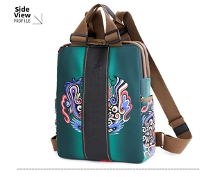 Detail view of ethnic gradient backpack with vibrant art print and premium zipper