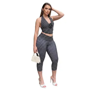Women's street style polka dot set featuring halter crop top and slim fit pants