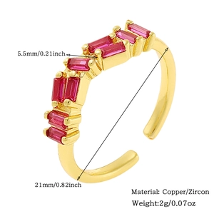 Detail of adjustable gold ring featuring red rectangular zircon and size measurements