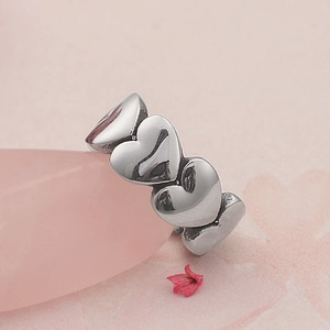 Vintage heart shaped sterling silver ring with a polished finish for women