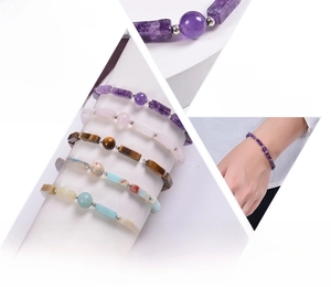 Macro detail of natural amethyst and quartz crystal stretch bracelet with silver spacers