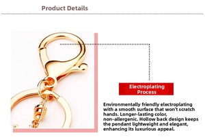 Detailed view of the gold-plated lobster clasp and hollowed-out metal key ring structure