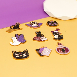 Collection of nine Halloween black cat enamel charms in varied magical witch designs