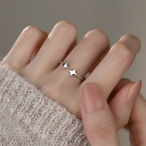 S925 Sterling Silver Four-Pointed Star Ring featuring two connected cubic zirconia stars