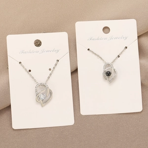 I love you to the moon and back engraved heart necklace with projection stone