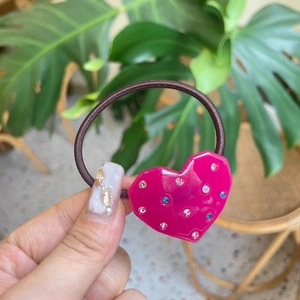 Cute pink heart hair tie with colorful rhinestones on a high-elastic brown rubber band
