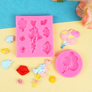 Pink silicone molds for heart balloons and lips for fondant cake decorating and DIY clay crafts