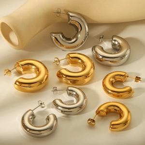Polished thick hollow C-shaped hoop earrings in gold and silver finish with multiple sizes