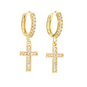 Classic gold cross drop earrings with sparkling white cubic zirconia on a white background