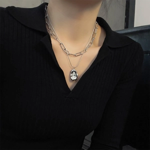 Modern double layer titanium steel necklace featuring a chunky link and lava pendant