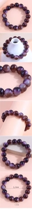 Detailed views of gradient purple glass beads bracelet with measurement specifications