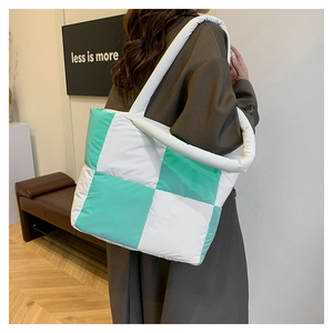 Quilted mint green and white checkerboard tote bag with padded shoulder straps