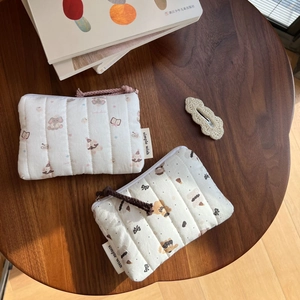 Quilted cotton pouches with pink elephant and brown bear prints for small storage