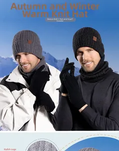 Detail view of winter cable knit hat set with soft fleece lining and pompom texture